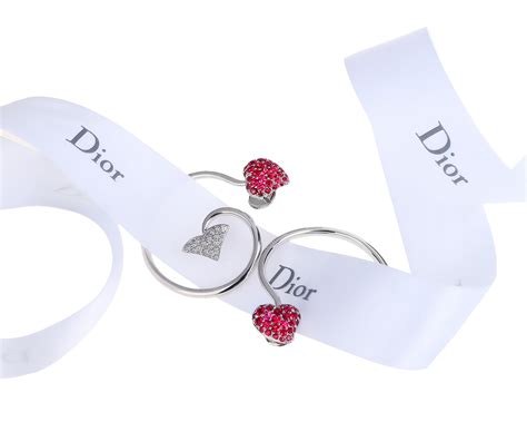 Оригинальные золотые серьги Dior .